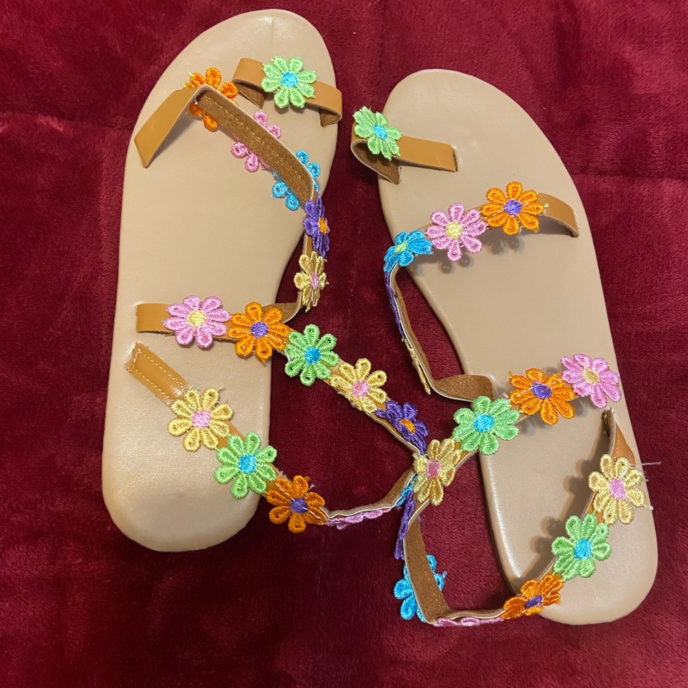 Flower sandals never worn